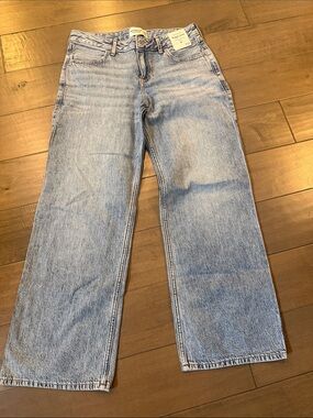 abercrombie kids lowrise baggy jeans with bow details on back pockets.
